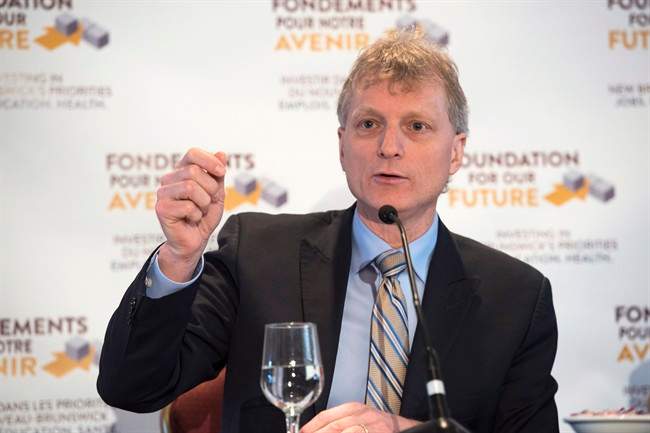 Treasury Board President Roger Melanson, speaks to the media on February 2, 2016 when he served as Finance Minister.
