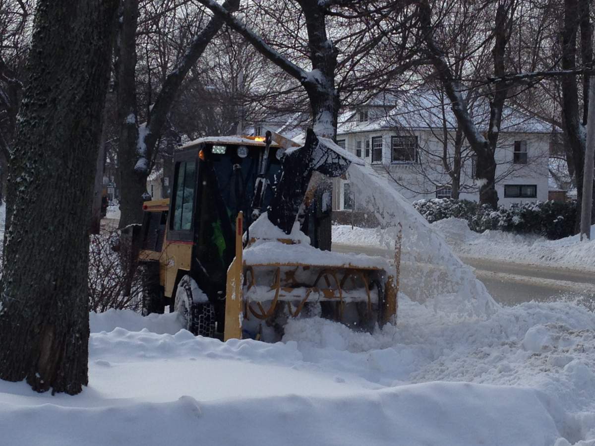 The municipality plans to continue its sidewalk clearing operations into Tuesday evening.