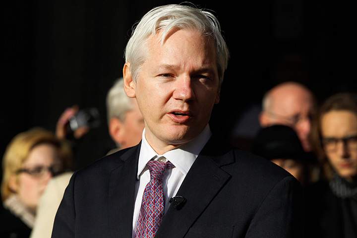 In this Dec. 5, 2011 file photo, WikiLeaks founder Julian Assange makes a statement to media gathered outside the High Court in London. 