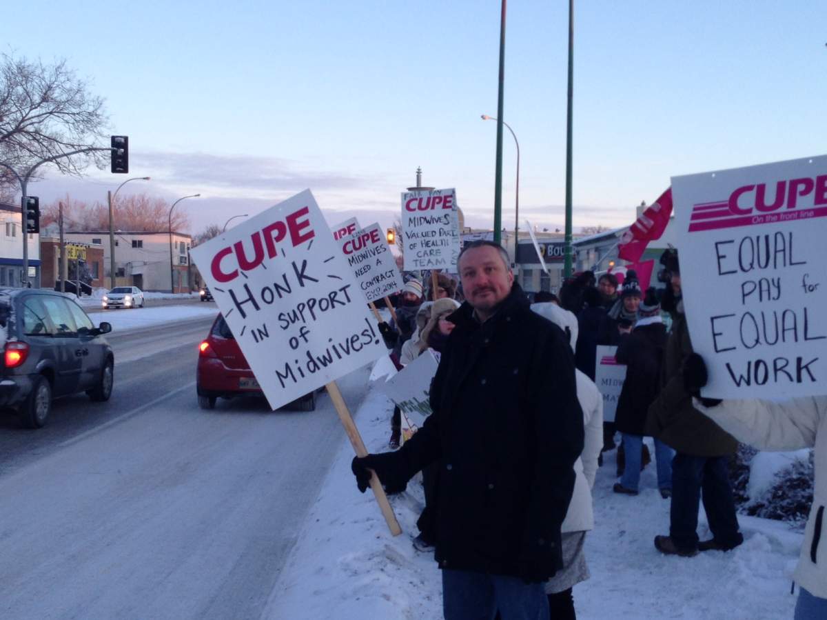 Midwives and supporters picketing in front of the Birth Centre on St. Mary’s Road Thursday morning.