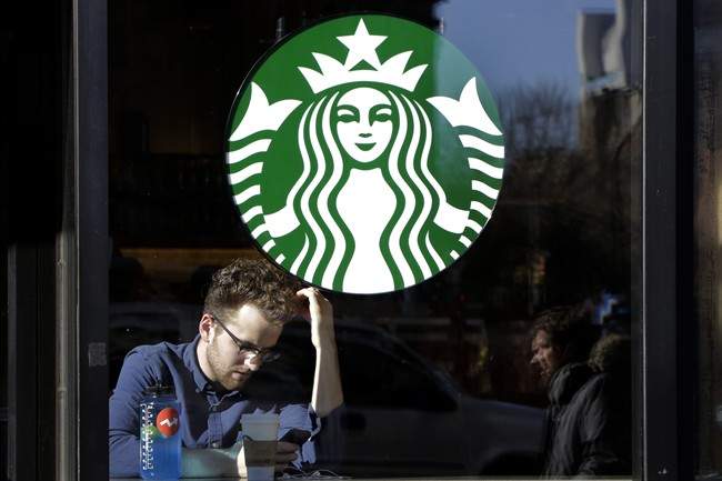 The Seattle-based coffee chain says its loyalty program will award stars based on the dollars spent starting in April. Currently, people earn a star for each transaction. 