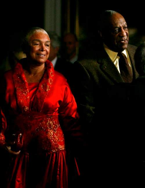 This Oct.26, 2009, file photo shows comedian Bill Cosby entering the Kennedy Center with his wife Camille in Washington. A federal judge in Massachusetts has ruled that Cosby's wife must answer questions under oath in a defamation lawsuit filed by seven women who claim Cosby sexually assaulted them decades ago.