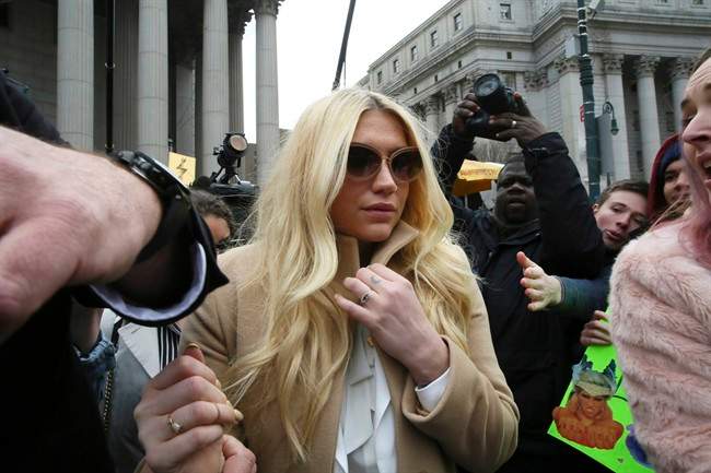 Pop star Kesha leaves Supreme court in New York, Friday, Feb. 19, 2016. 