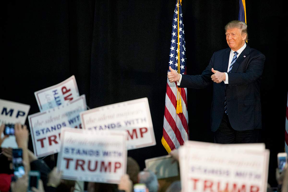 Republican presidential candidate Donald Trump steps on stage to speak during a campaign event at Plymouth State University Sunday, Feb. 7, 2016, in Plymouth, N.H.