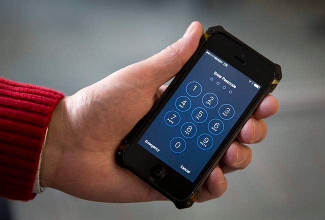 An iPhone is seen in Washington, Wednesday, Feb. 17, 2016.