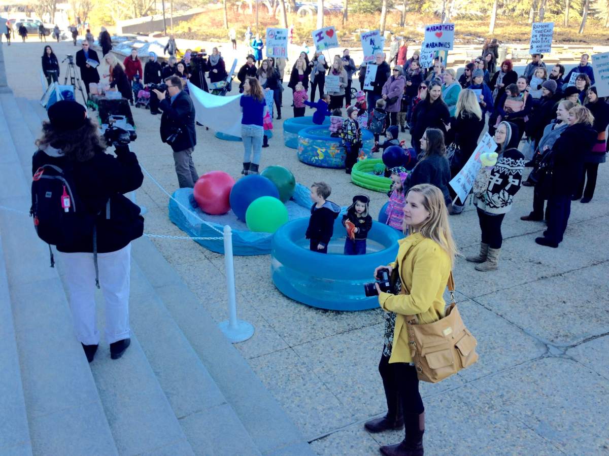 Midwives and their supporters gather at the Alberta legislature Wednesday, March 9, 2016.