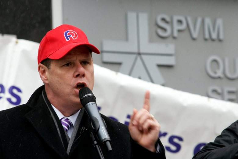 Yves Francoeur, president of the Montreal police officers union, is pictured at a rally in Montreal. 