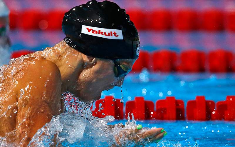 Russia's Yuliya Efimova swims in a women's 50m breaststroke heat at the FINA Swimming World Championships in Barcelona, Spain. The swimmer was later banned for 16 months for doping and her record time voided. 