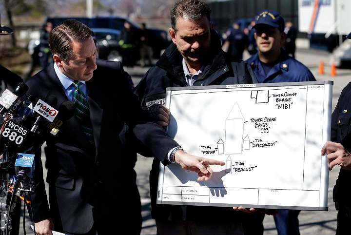Westchester County Executive Rob Astorino, left, uses a diagram to explain the circumstances of a fatal collision on the water in Tarrytown, N.Y., Saturday, March 12, 2016.