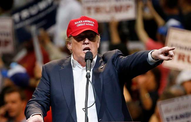 Republican presidential candidate Donald Trump speaks during a campaign rally Saturday, March 19, 2016, in Tucson, Ariz. (AP Photo/Ross D. Franklin).