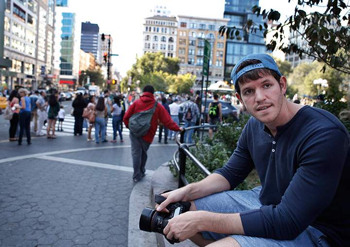 This Oct. 2, 2013 photo shows street portrait photographer Brandon Stanton near Union Square in New York. 