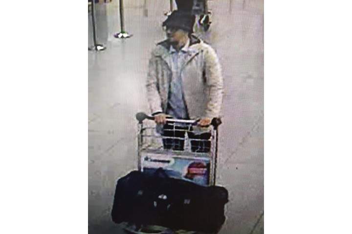 In this image provided by the Belgian Federal Police in Brussels on Tuesday, March 22, 2016, a man who is suspected of taking part in the attacks at Belgium’s Zaventem Airport.