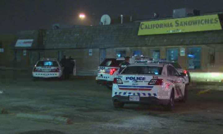 Police investigate a break-and-enter at a restaurant in west-end Toronto on March, 7, 2016.