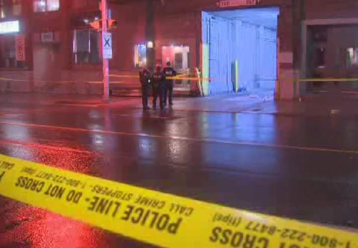 Police investigate a fatal shooting in Leslieville on March 24, 2016.