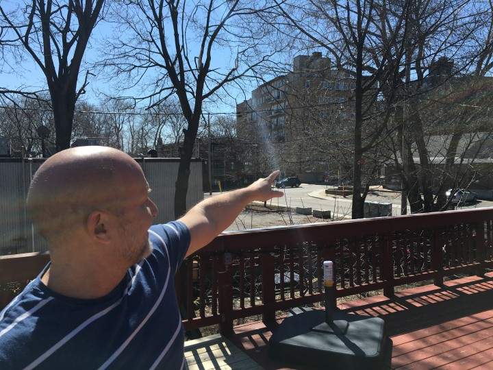 Florence Bordelage's husband shows how the condo would have a direct view on their terrace. Tuesday, March 29, 2016.