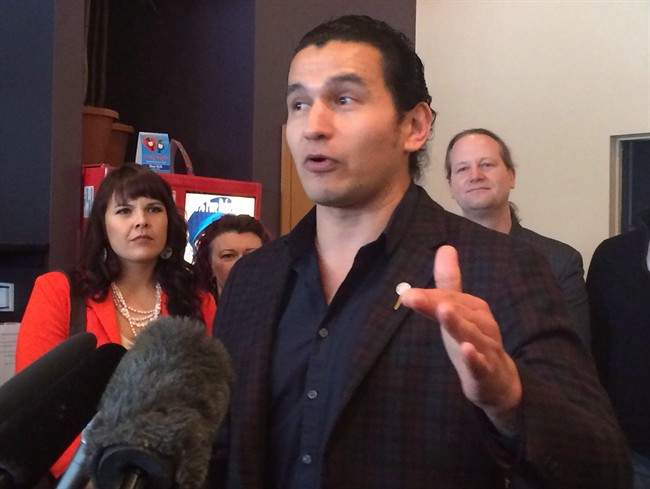 Wab Kinew is facing questions about lyrics he wrote and performed that are demeaning to women and gays and lesbians.