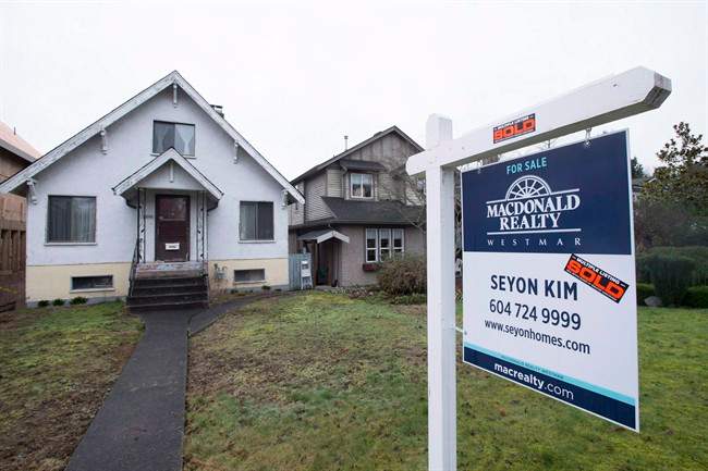 A sold home is pictured in Vancouver, B.C., Thursday, Feb. 11, 2016.