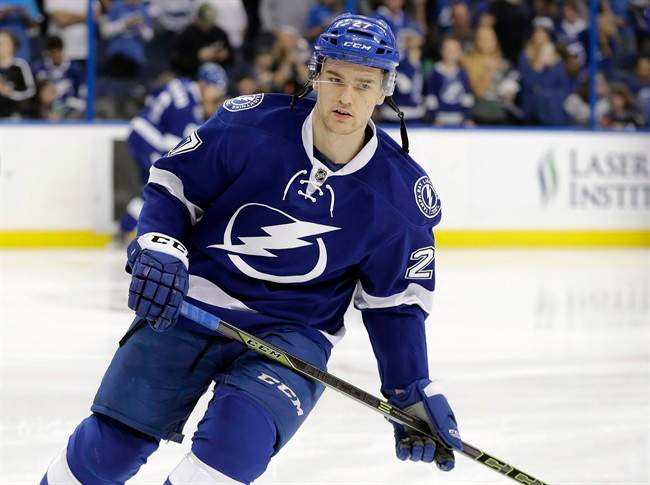Tampa Bay Lightning left wing Jonathan Drouin (27) skates before an NHL hockey game against the New York Rangers, in Tampa, Fla, Dec.30, 2015.