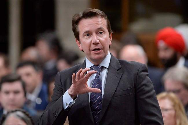 Treasury Board President Scott Brison answers a question in the House of Commons in February.