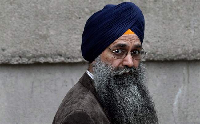 Inderjit Singh Reyat, the only man ever convicted in the Air India bombings of 1985, waits outside B.C. Supreme Court in Vancouver on Friday, September 10, 2010. 