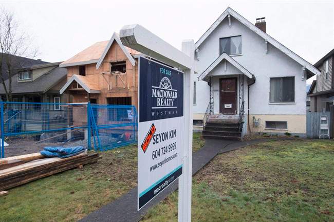 A sold home is pictured in Vancouver, B.C., Thursday, Feb. 11, 2016.
