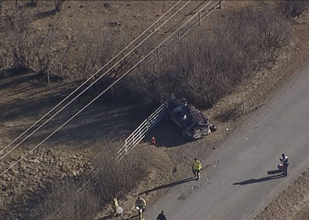 Emergency crews respond to a fatal collision south of Calgary on Dunbow Road on Monday, March 7, 2016. 