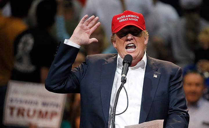 In this March 19, 2016 file photo, Republican presidential candidate Donald Trump speaks during a campaign rally in Tucson, Ariz.  
