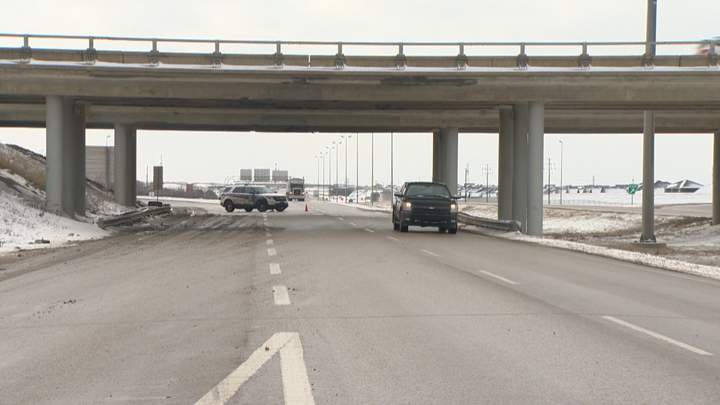 Overpass at Highway 11 and Circle Drive damaged after a cultivator being hauled by a semi hit the structure.