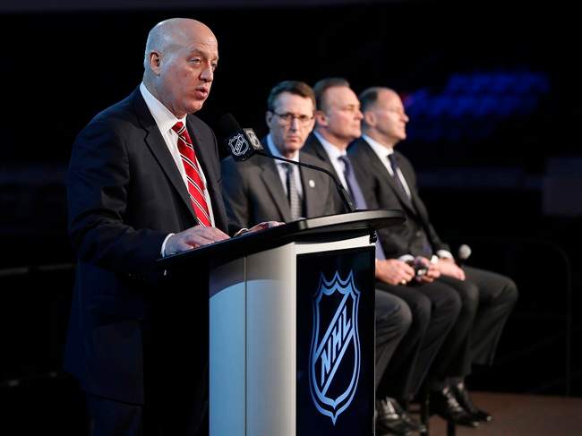 NHL Deputy Commissioner Bill Daly announces the Heritage Classic between the Winnipeg Jets and the Edmonton Oilers on Sunday as Jets Chairman Mark Chipman, Hockey Hall of Fame member Dale Hawerchuk and Oilers Entertainment Group Vice-Chairman Kevin Lowe listen in.
