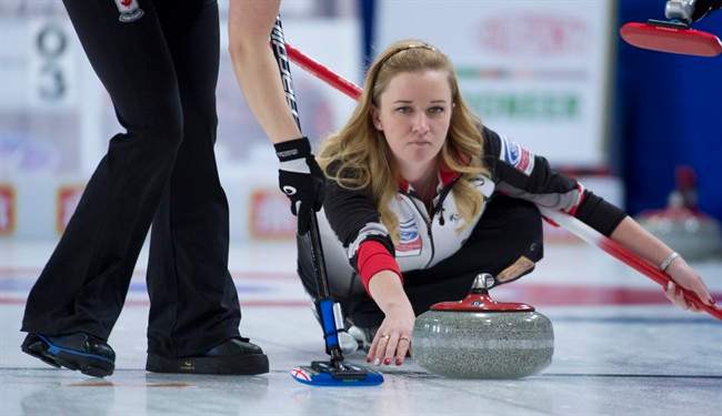 Team Canada's Chelsea Carey makes a shot during the first draw against Denmark at the Ford World Women's curling in Swift Current, Sask. Saturday, March 19, 2016.