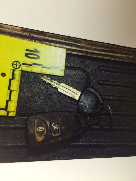 A photo of SUV keys found in a truck located at a salvage yard is submitted as evidence in Travis Vader’s murder trial.