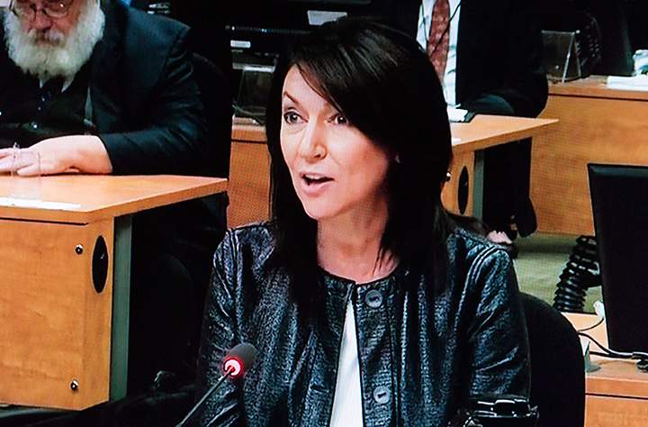 In this file photo, Former Quebec Liberal cabinet minister Nathalie Normandeau is pictured off a television monitor at the Charbonneau inquiry looking into corruption in the Quebec construction industry Wednesday, June 18, 2014 in Montreal.