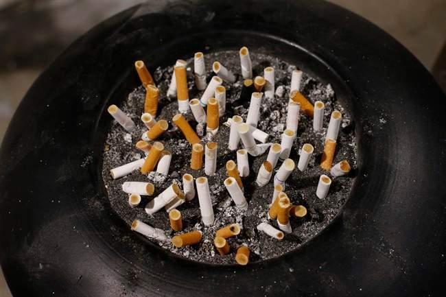 Smoked cigarettes in an ash tray.