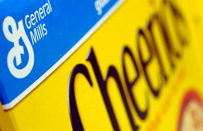 In this Dec. 15, 2007 file photo, a box of General Mills' Cheerios is seen on a shelf at a Shaw's Supermarket in Gloucester, Mass.