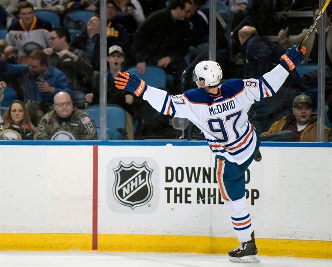 Edmonton Oilers center Connor McDavid celebrates his overtime goal against the Buffalo Sabres in an NHL hockey game Tuesday, March 1, 2016, in Buffalo, N.Y. Edmonton won 2-1.