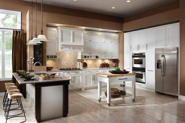 The era of the "super kitchen'' has arrived, say interior designers and trend-watchers: People are building or remodeling kitchens that include work and entertainment space, too.