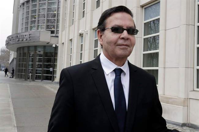 Former Honduran President Rafael Callejas leaves federal court in New York, Monday, March 28, 2016. Calleja has pleaded guilty to conspiracy charges in a wide-ranging FIFA soccer scandal.