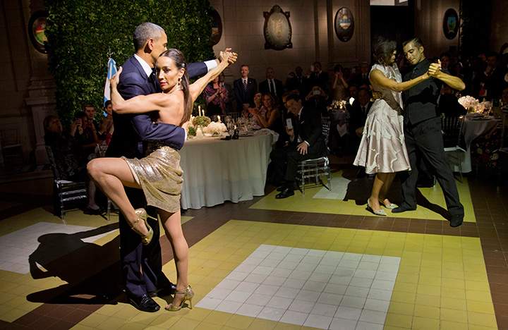 President Barack Obama and first lady Michelle Obama dance the tango with dancers during the State Dinner at the Centro Cultural Kirchner, Wednesday, March 23, 2016, in Buenos Aires, Argentina.