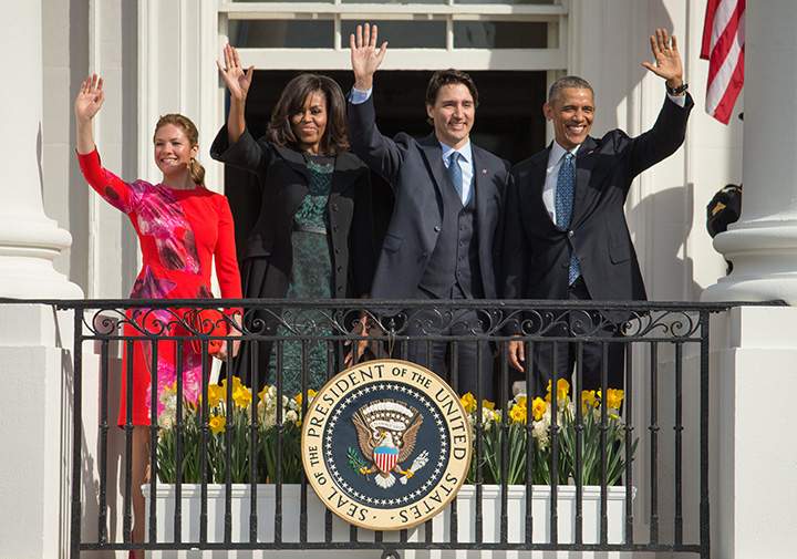 President Barack Obama and First Lady Michelle Obama wave with Canadian Prime Minister Justin Trudeau, and his wife Sophie Gregoire-Trudeau, on the Truman Balcony during an arrival ceremony on the South Lawn of the White House in Washington, Thursday, March 10, 2016.