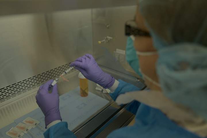 A virus is prepared to be administered to a patient at Rutgers Cancer Institute of New Jersey