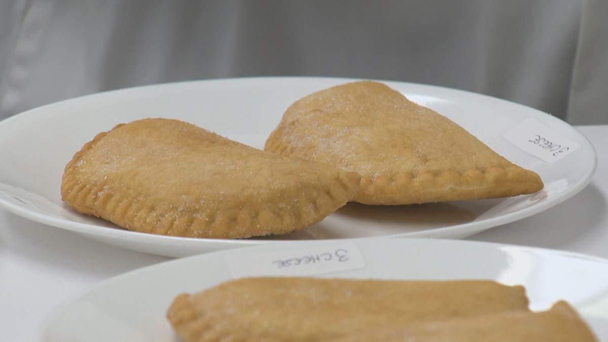 Two Pizza Pops undergo a quality control process in Winnipeg.