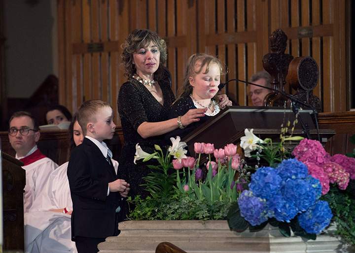 Former Toronto mayor Rob Ford’s widow, Renata, and son Dougie look on as daughter Stephanie speaks at her father’s funeral at St. James Cathedral in Toronto on Wednesday, March 30, 2016.