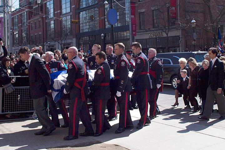 Renata Ford walks behind husband Rob Ford’s casket with her son Dougie, daughter Stephanie and mother-in-law Diane as it is carried into Toronto’s St. James Cathedral, on Wednesday, March 30, 2016.
