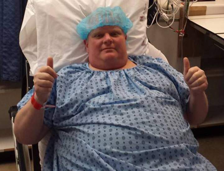 Rob Ford gives two thumbs up as he poses for a photo before surgery to remove a cancerous tumour from his abdomen in Toronto on Monday, May 11, 2015 (THE CANADIAN PRESS/HO/Dan Jacobs).