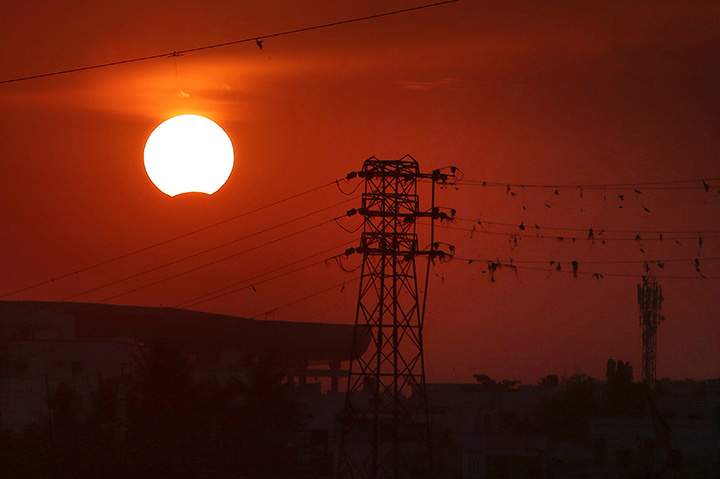 A partial solar eclipse is seen in Hyderabad, India, Wednesday, March 9, 2016.