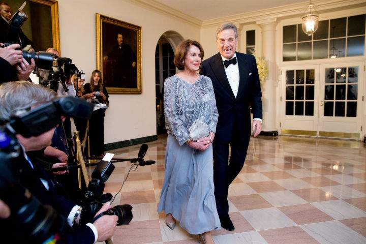 House Minority Leader Nancy Pelosi of Calif., and her husband Paul arrive for a State Dinner for Prime Minister Justin Trudeau, Thursday, March 10, 2016, at the White House in Washington.