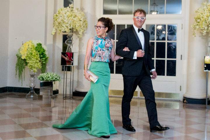 Actress Sandra Oh and Lev Rukhin arrive for a State Dinner for Canadian Prime Minister Justin Trudeau, Thursday, March 10, 2016, at the White House in Washington.