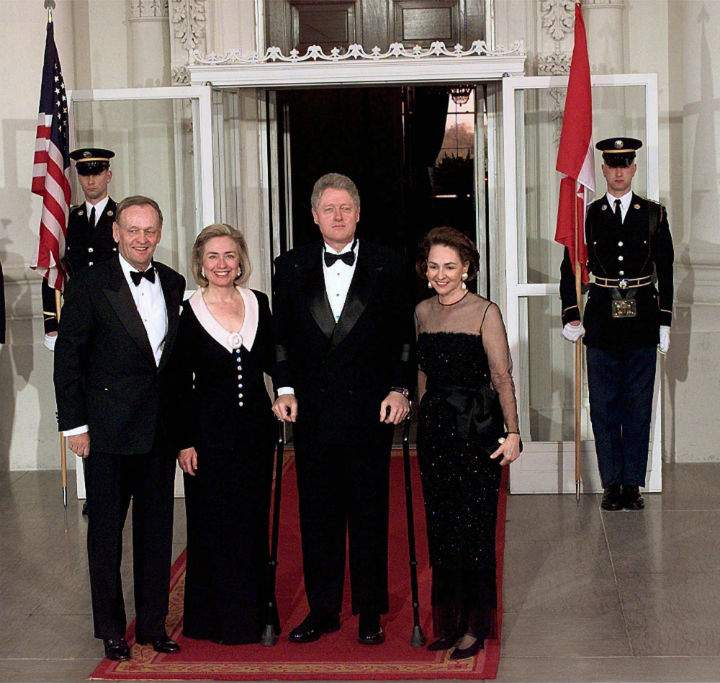President Bill Clinton and Hillary Clinton pose with Canadian Prime Minister Jean Chretien and his wife Aline at the North Portico of the White House on April 8, 1997.