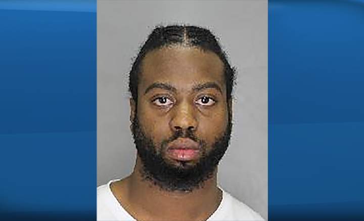 Police say a warrant has been issued for the arrest of Malcolm Edwards charging him with three counts of attempted murder and numerous firearms offences.