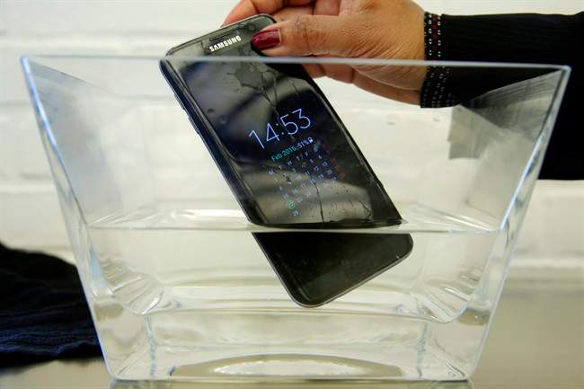 A waterproof Samsung Galaxy S7 Edge mobile phone is submersed in water during a preview of Samsung's flagship store, Samsung 837, in New York's Meatpacking District. SquareTrade, a company that offers extended-protection plans for gadgets, said the Galaxy S7 and S7 Edge still functioned after being submerged in water for 30 minutes.